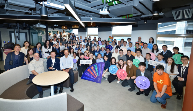 Faculty members and staff gather to celebrate the establishment of the School of Computing and Data Science.
 